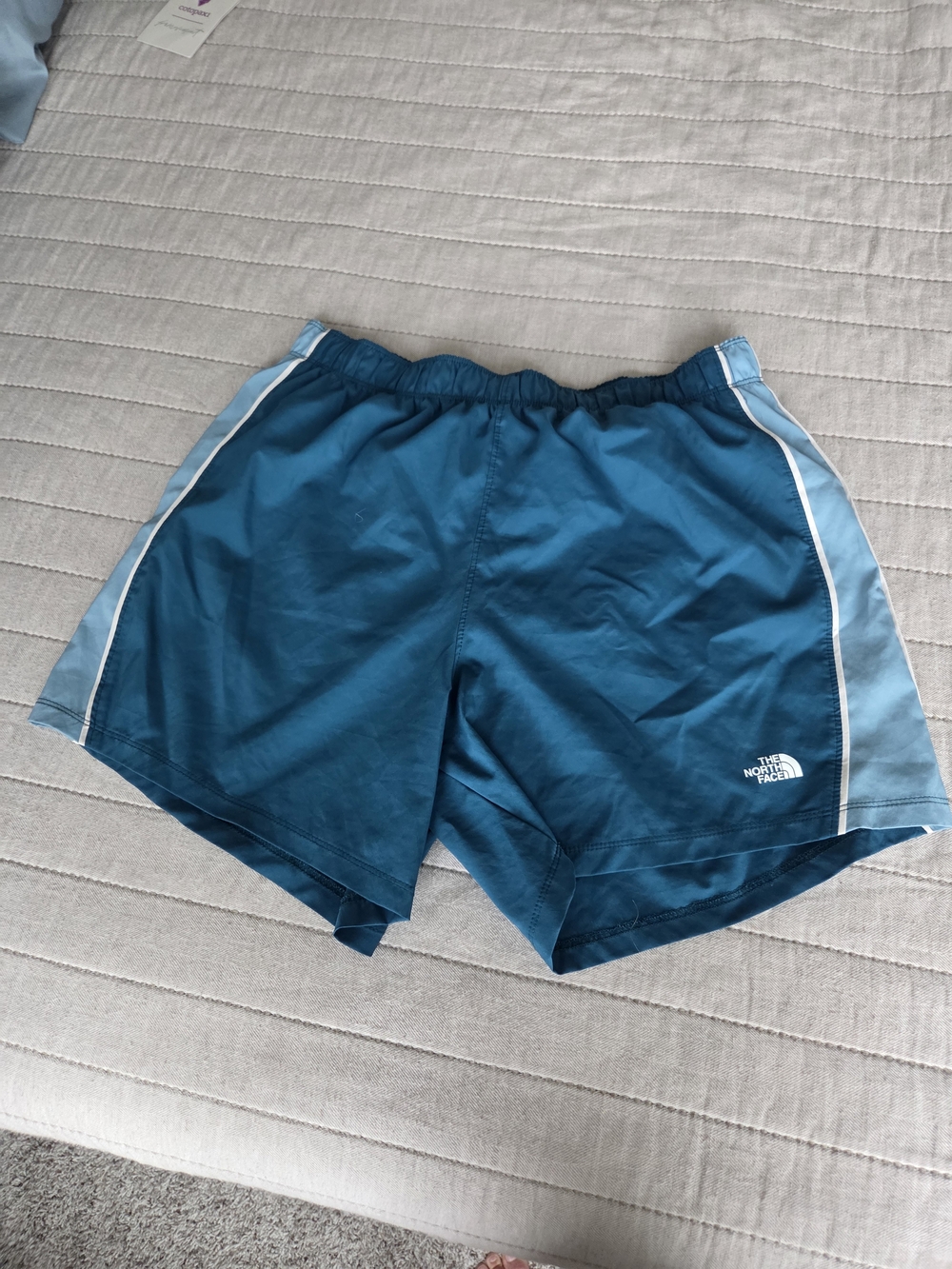 The North Face Men’s Teal Running Shorts with Light Blue Panels